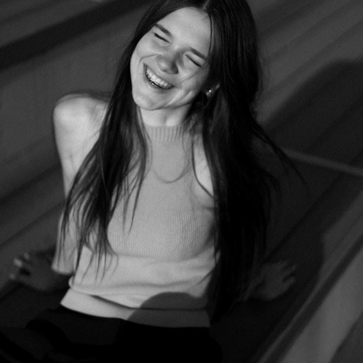 Taylor Chen, Client Relations Director, discussing corporate gifting strategy with business clients